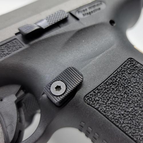 Driven Arms Canik Mag Release Carry photo